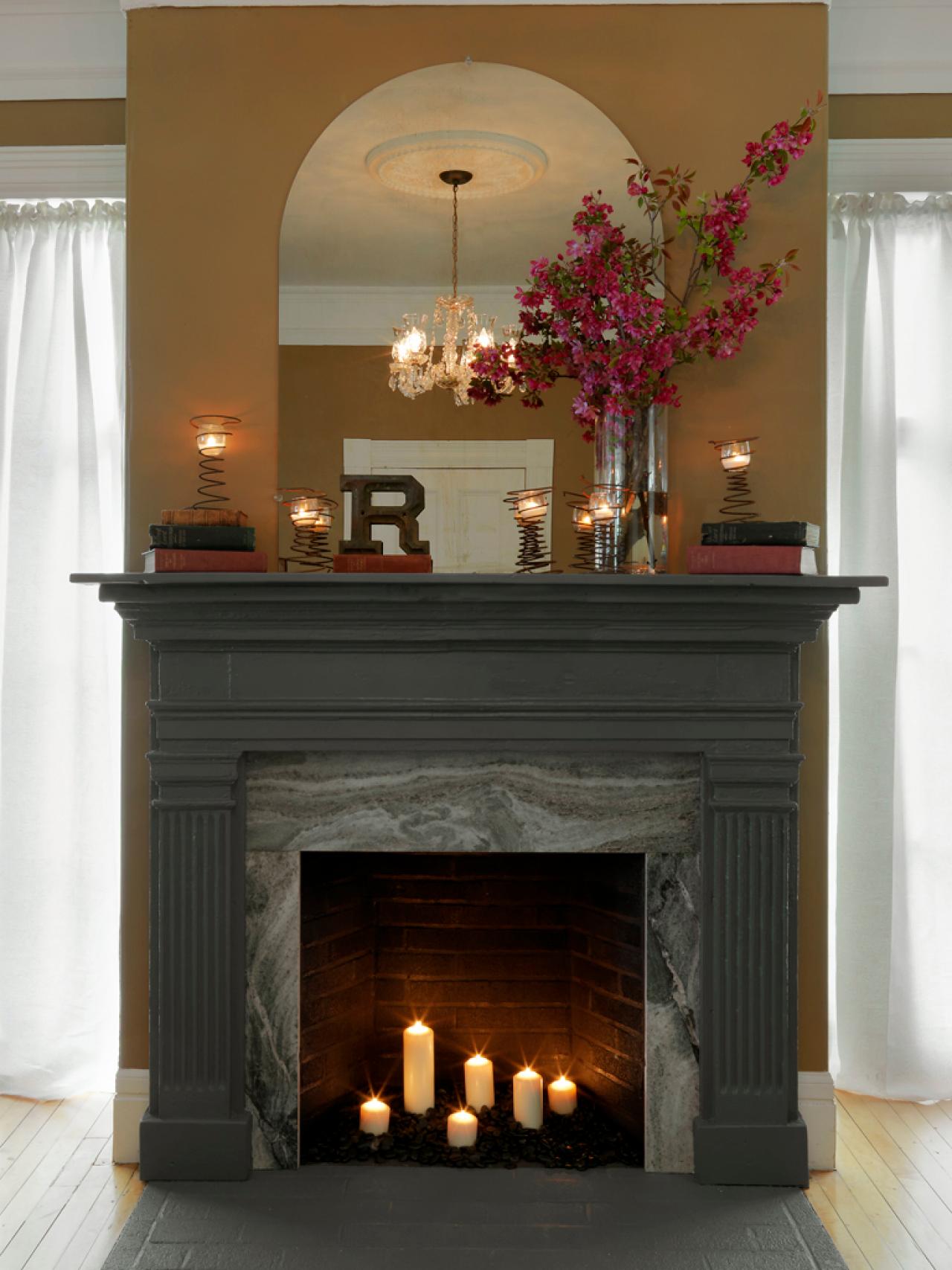 DIY Network has instructions on how to cover an old fireplace surround with marble and create a new mantel using an old door frame and molding.