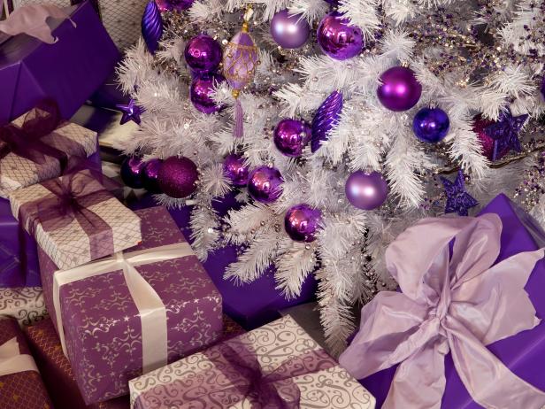 LOS ANGELES, CA, OCTOBER 06 2011: Close up on the Xmas tree's ornamemts and gifts in Alison Sweeney's family room in her Hollywood Hills home, ready for Xmas after being decorated by HDTV interior designer Sandra Espinet, with a large white tree, and accessories on the coffee table and mantle all keeping with a purple theme. 