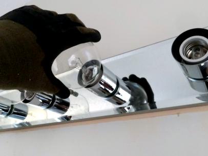 How To Replace A Bathroom Light Fixture Tos Diy - How To Take Off Bathroom Light Cover