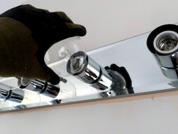 How To Replace A Bathroom Light Fixture Tos Diy - How To Remove Bathroom Vanity Light Fixture