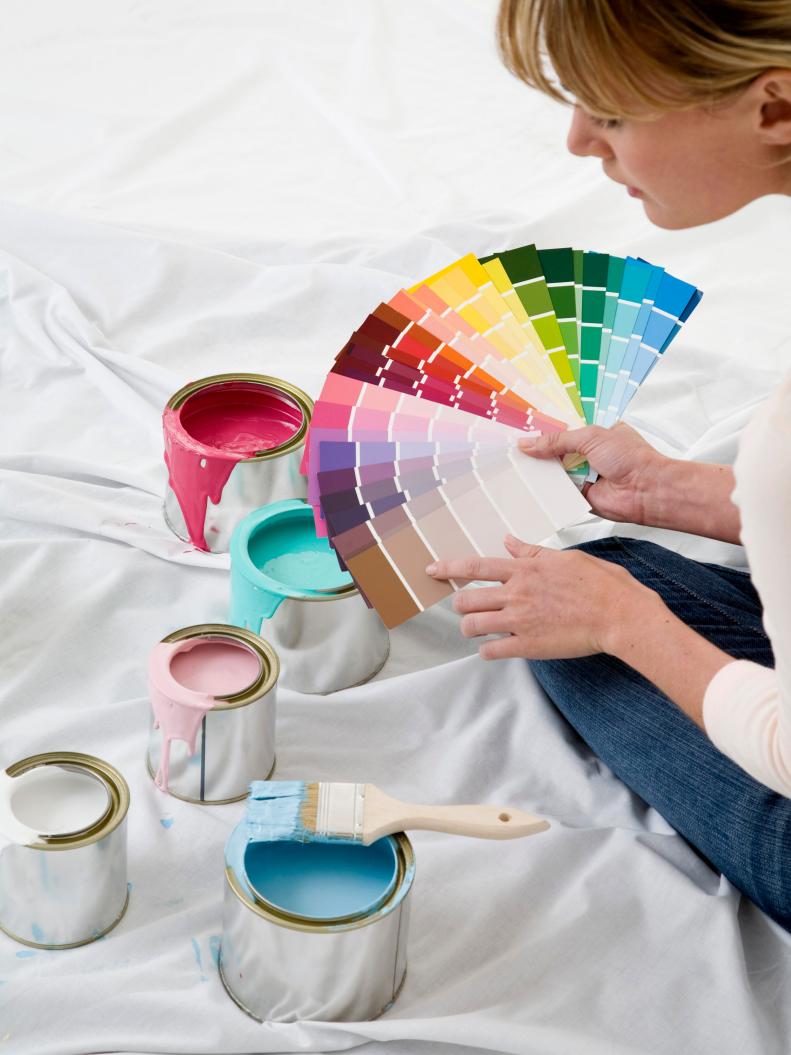 Woman Holding Paint Swatches