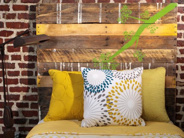 Create a rustic wooden headboard from used shipping pallets