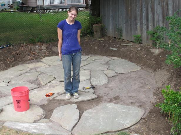 A Flagstone Patio With Irregular Stones, How To Install Patio Stones On Grass