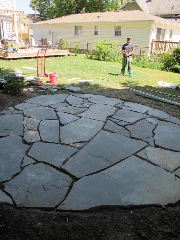 A Flagstone Patio With Irregular Stones, How To Prepare For Flagstone Patio