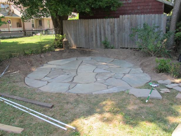 A Flagstone Patio With Irregular Stones, How To Build A Stone Patio On Grass