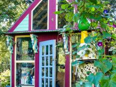 The curly corbles along the front of the she shed as well as the door are vintage and were found at a flea market in East Texas.