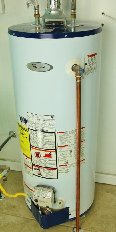 Replace two water heaters with one? The tank on the right is done