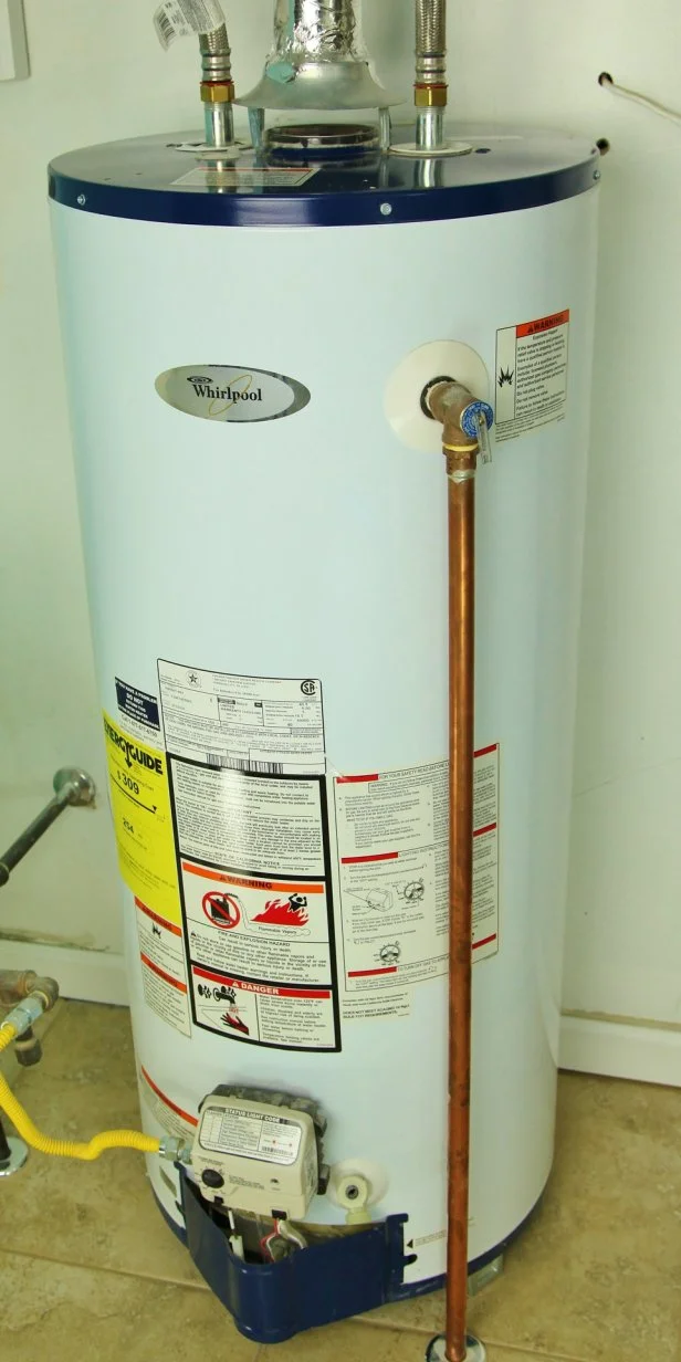 A standard tank hot-water heater. 