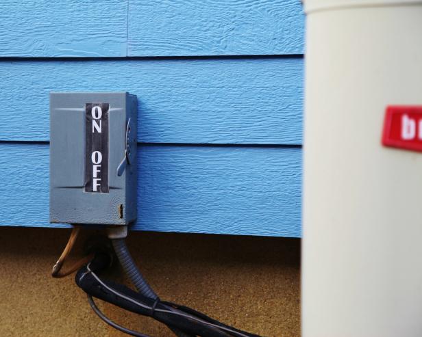 Turn off power to an HVAC unit on the exterior at the shut-off.