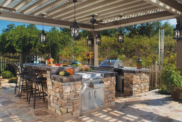 Outdoor Kitchen Under Custom Pergola