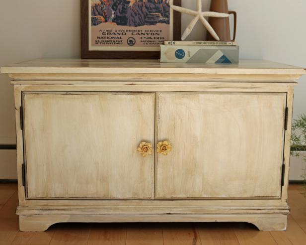 refinished cabinet with a distressed stain