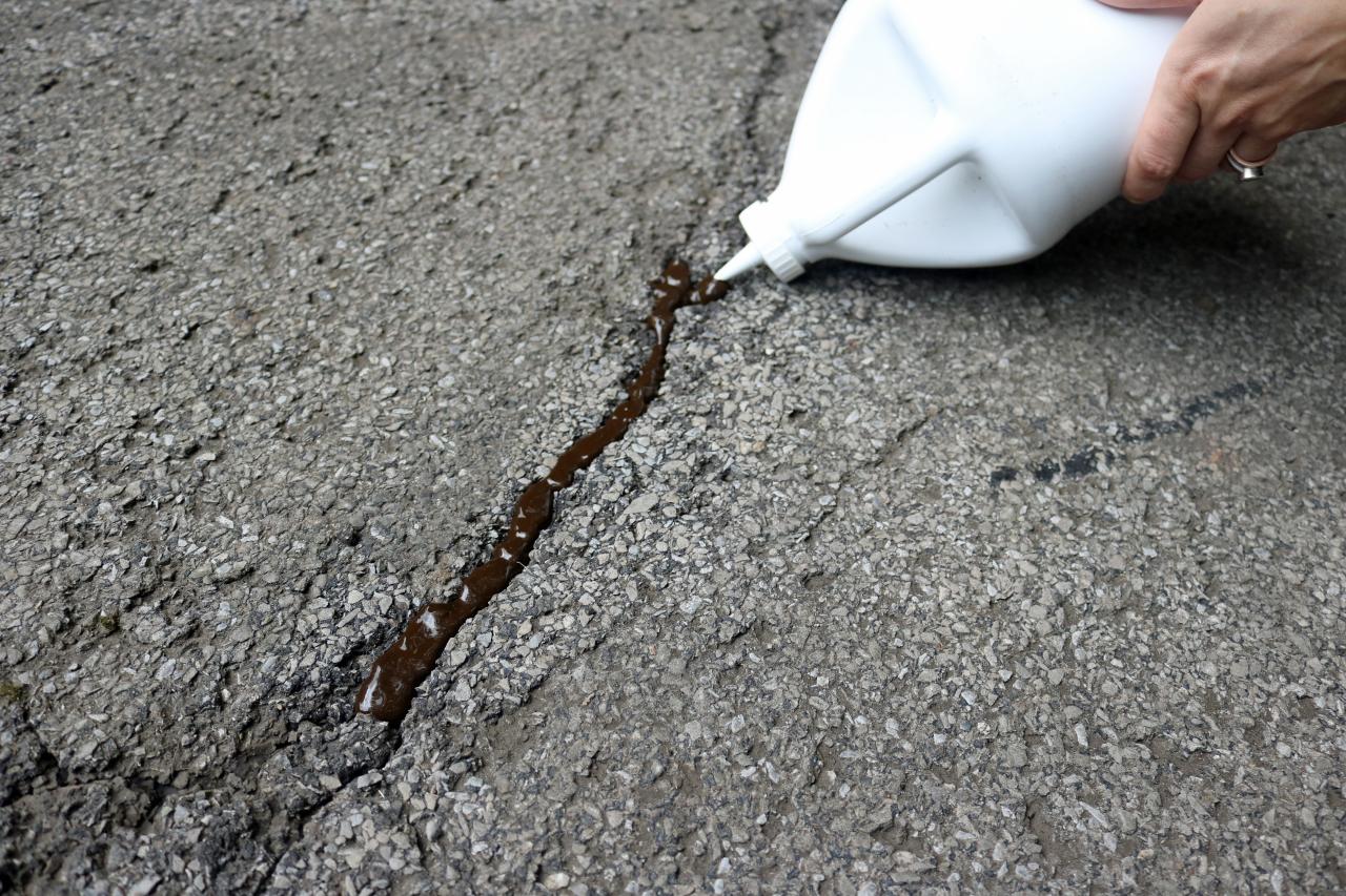 Repair Cracks and Apply Sealer to an Asphalt or Blacktop Driveway