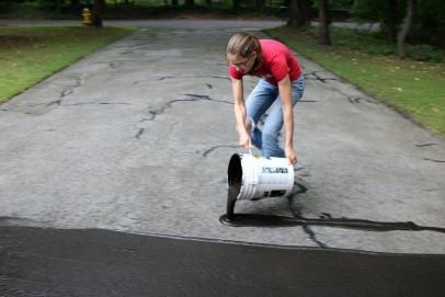 How To Fix Cracks In A Driveway And Apply A Coat Of Sealant How