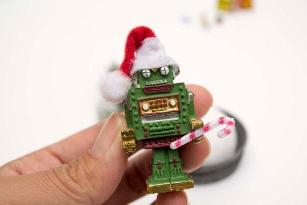 Glue accessories onto toy robot