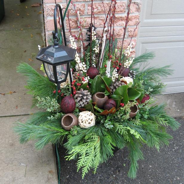 Winter Container Garden With Magnolia Leaves and Evergreens