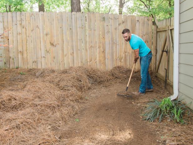 Step 1- Excavate Area
Rake area and remove any old landscaping materials, rocks and debris for the pathway.