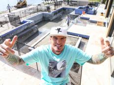 Host Rob Van Winkle (a.k.a. Vanilla Ice) near the infinity pool designed by Cushing Pools for his new project in Lake Worth, Florida, as seen on The Vanilla Ice Project.