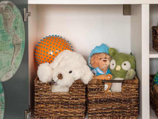 Within Reach: 

Keeping toys and stuffed animals at baby’s level is a great way to keep them occupied with what’s theirs. Toys can stay organized in baskets to decrease clutter and help them learn how to put toys away. It’s a win-win!