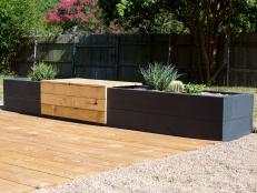 Add a garden to your deck or patio with this combination raised planter box and bench.