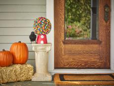 With a little patience (and a whole lot of gumballs), you can create a one-of-a-kind decor piece that trick-or-treaters will flock to this Halloween.