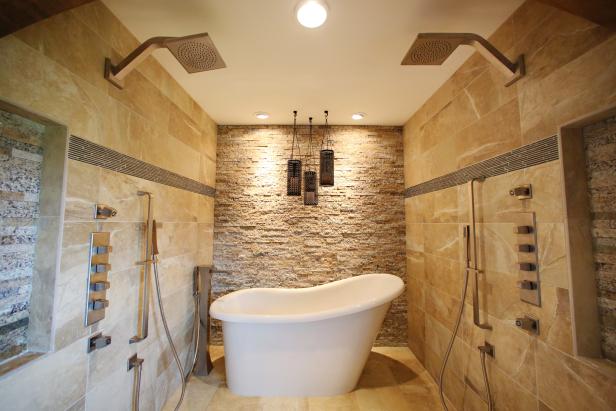 Neutral Wet Room with a White Freestanding Bathtub