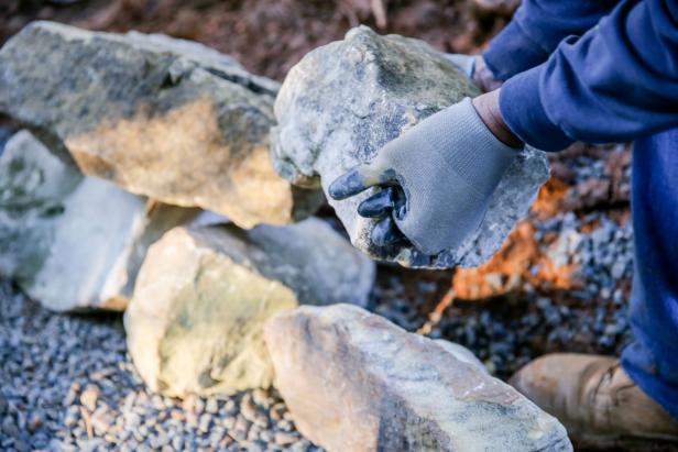 How To Build A Boulder Retaining Wall | How-tos | DIY