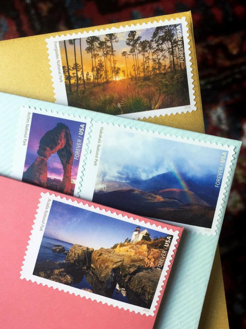 Three Envelopes With Stamps Featuring Landscapes and Nature Scenes