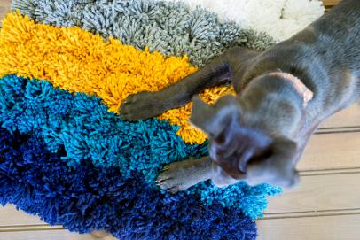 photo How To Make A Rug Out Of Yarn Pom Poms easy yarn pom pom rug diy network