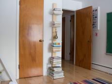 Use MDF and a 2x4 to build a vertical book tower.