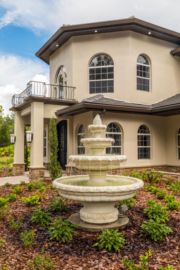 Contemporary Home Renovation With Wrought Iron Accents And