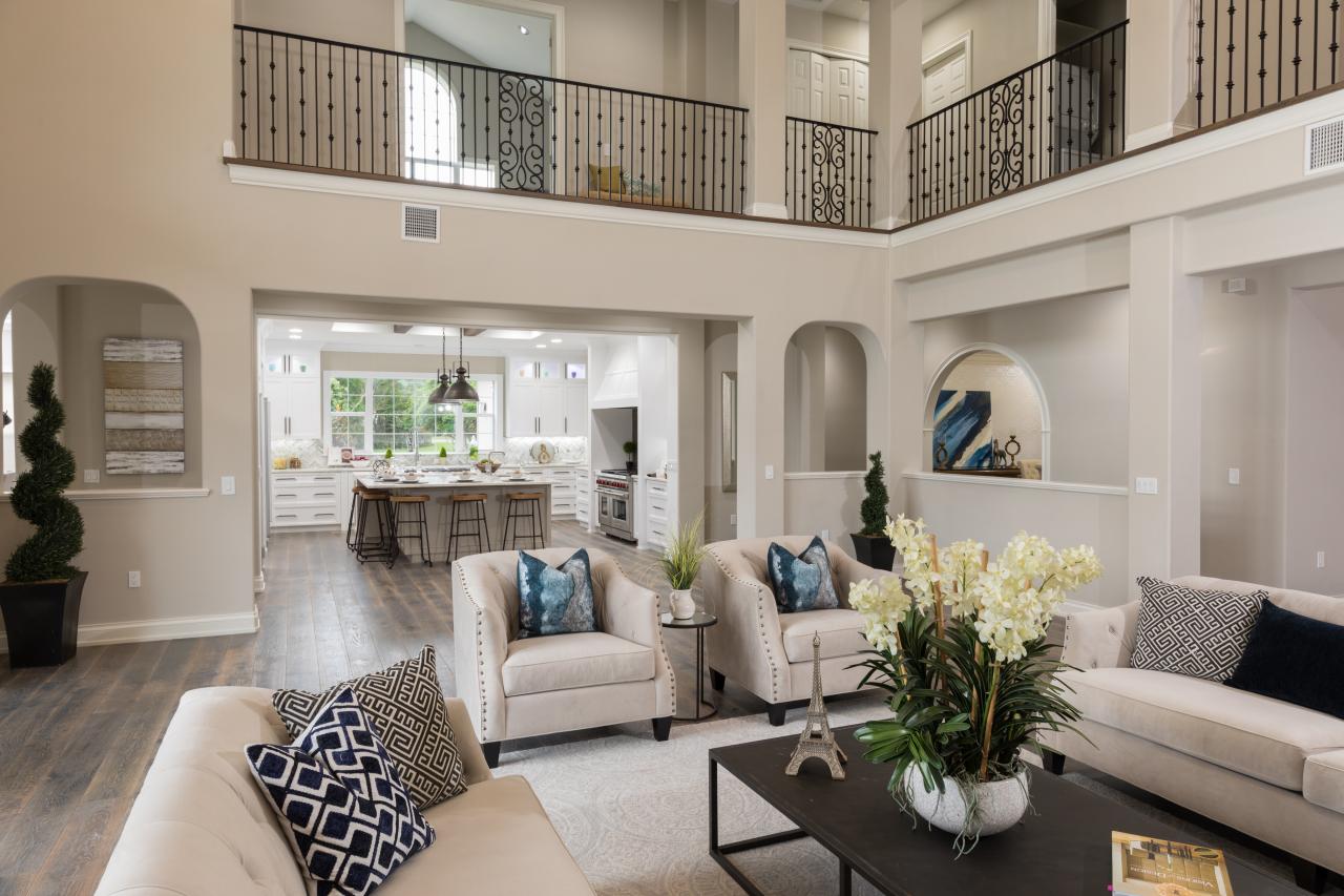 Great Room With Contemporary White Upholstered Furnishings 