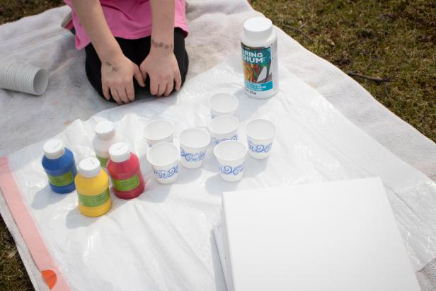 How to make pour art painting kid-friendly with washable paints.