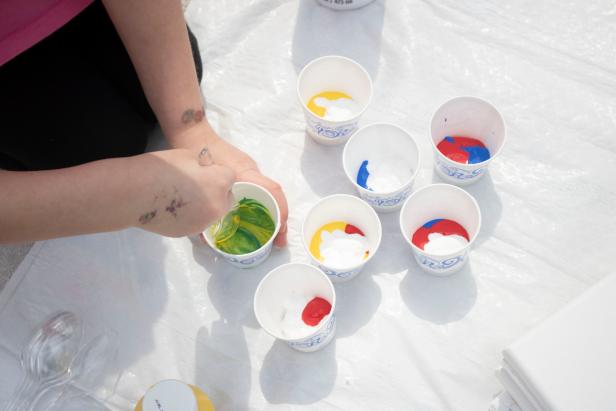 How to make pour art painting kid-friendly with washable paints.