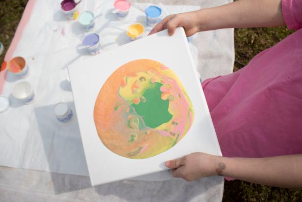 How to make pour art painting kid-friendly with washable paints.