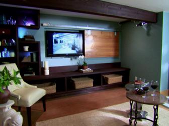 The basement area has a slider to cover the tv during open parties.